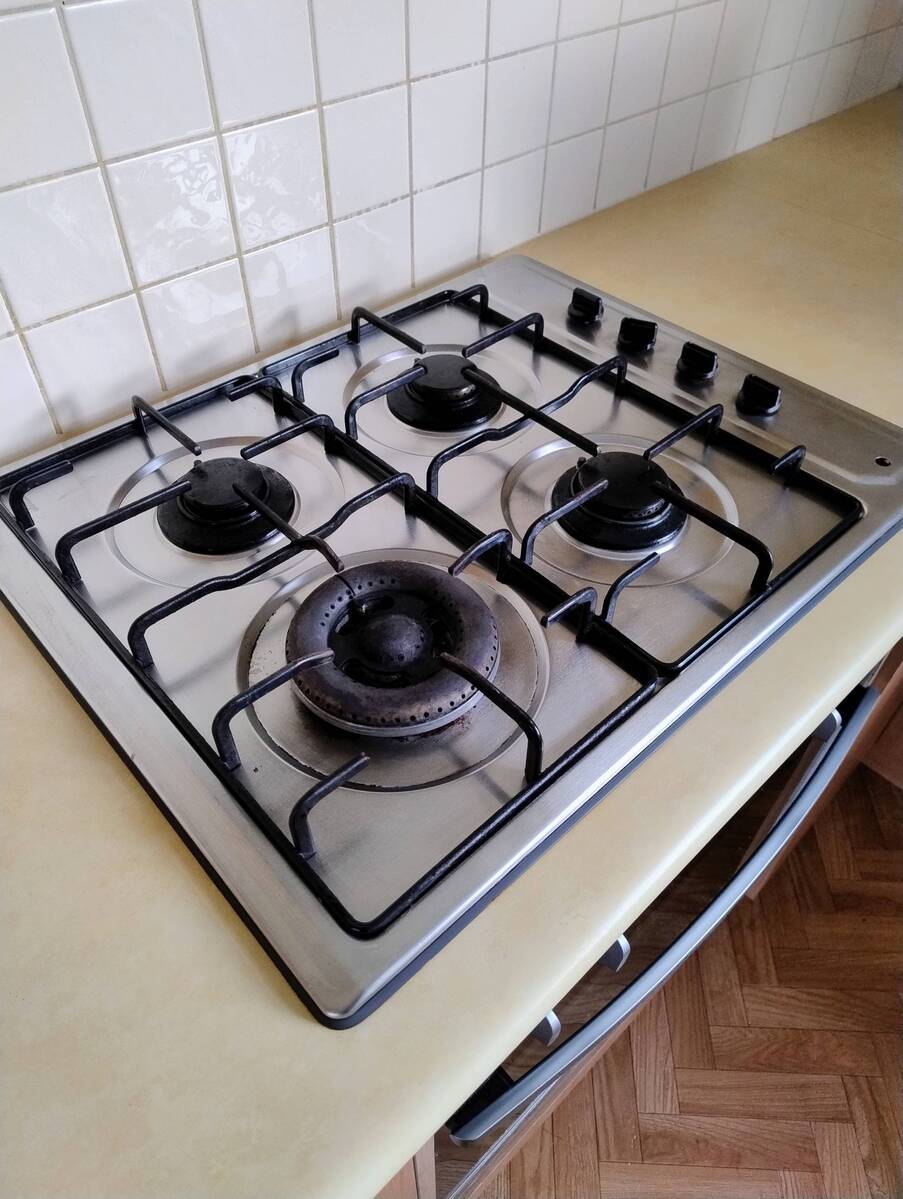 The same oven, spotless after our clean