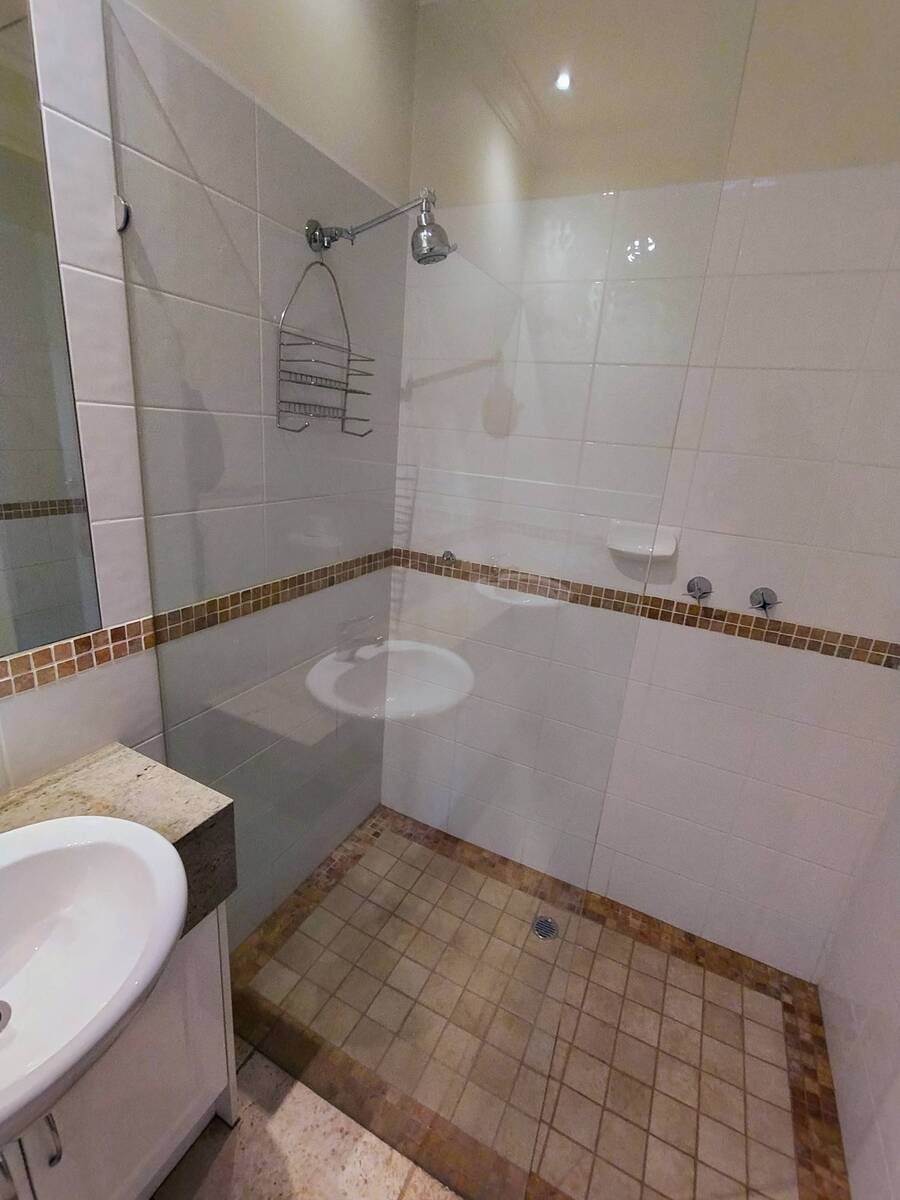 The same shower screen, clear and streak free after cleaning